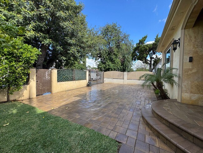 Building Photo - Peaceful North Hollywood street, charming three-bedroom, three-bathroom residence