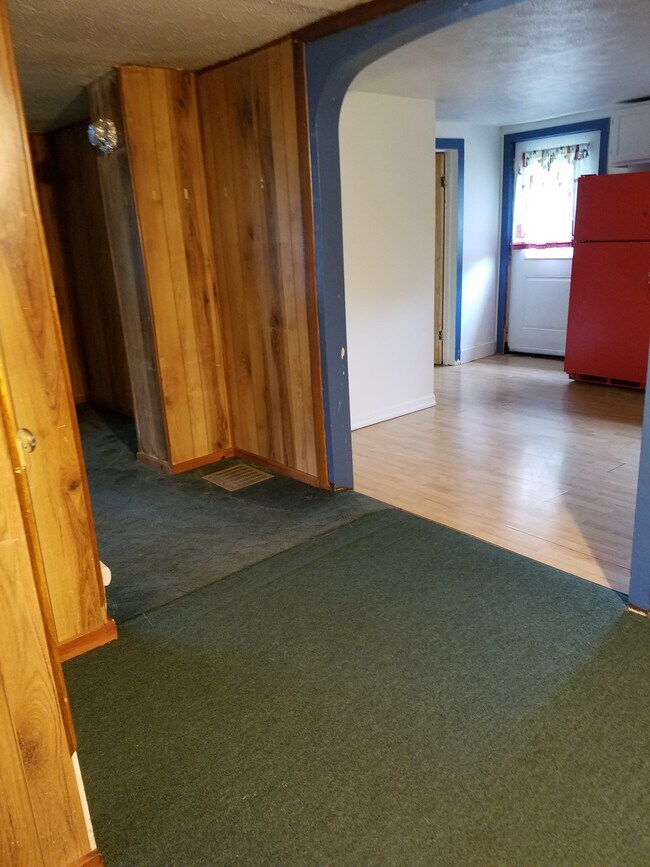 Dining room viewing west with entry to Livingroom to the left and entry to Kitchen to the right. - 15 Goodrich St