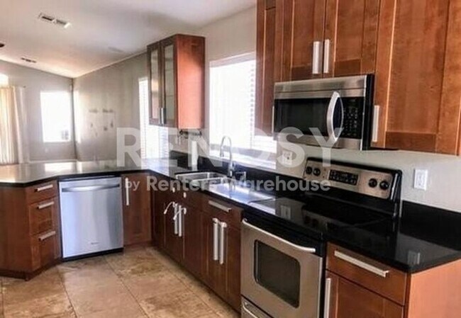 Building Photo - PRICE REDUCED – Fresh Updates in Prime Scottsdale Location!