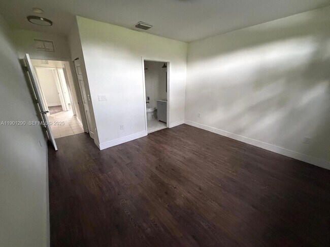 Building Photo - 3390 NE 13th Cir Dr