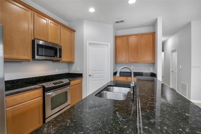 Building Photo - 12702 Salomon Cove Dr