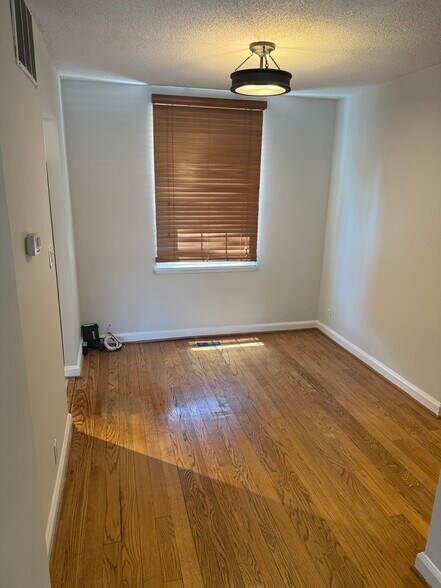 Dining room with new light fixture - 4218 35th St S