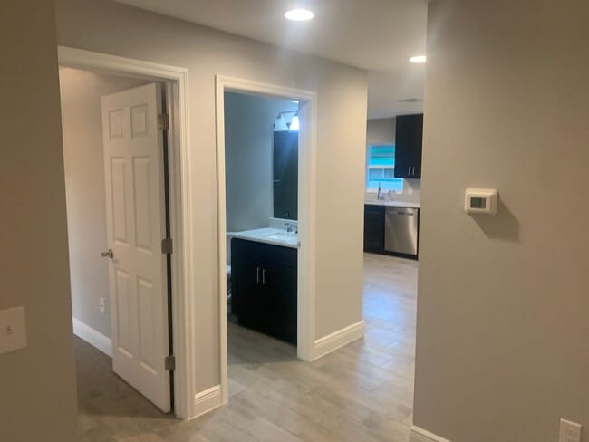 Hallway leading to master and to kitchen - 2107 Waitman Ave