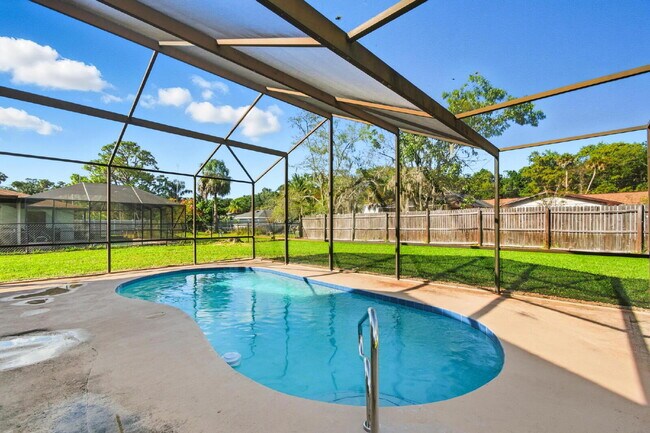 Building Photo - "Charming 3-Bedroom Oasis with 2 Baths on ...