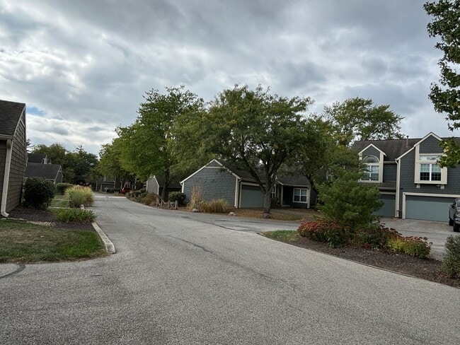 Building Photo - Charming Condo in a Can't-Miss Location – Private Deck, Garage, and Nature-Filled Community