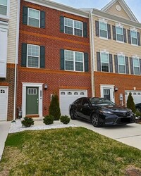 Building Photo - Stunning 3-Story Brick-Front Townhome | Modern Living + Military & First Responder Discount