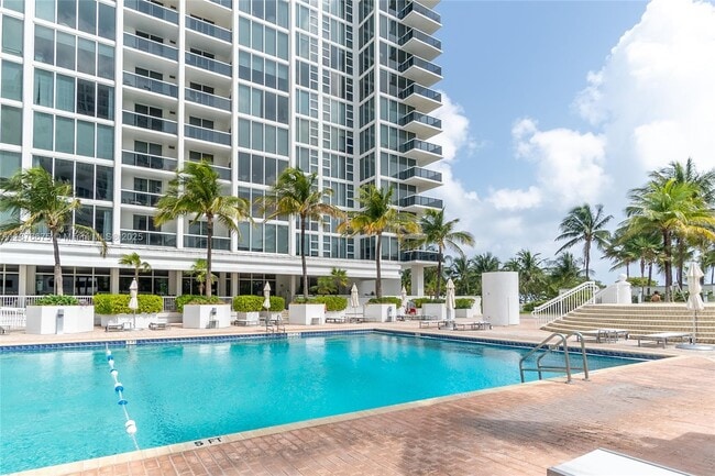 Building Photo - 10275 Collins Ave
