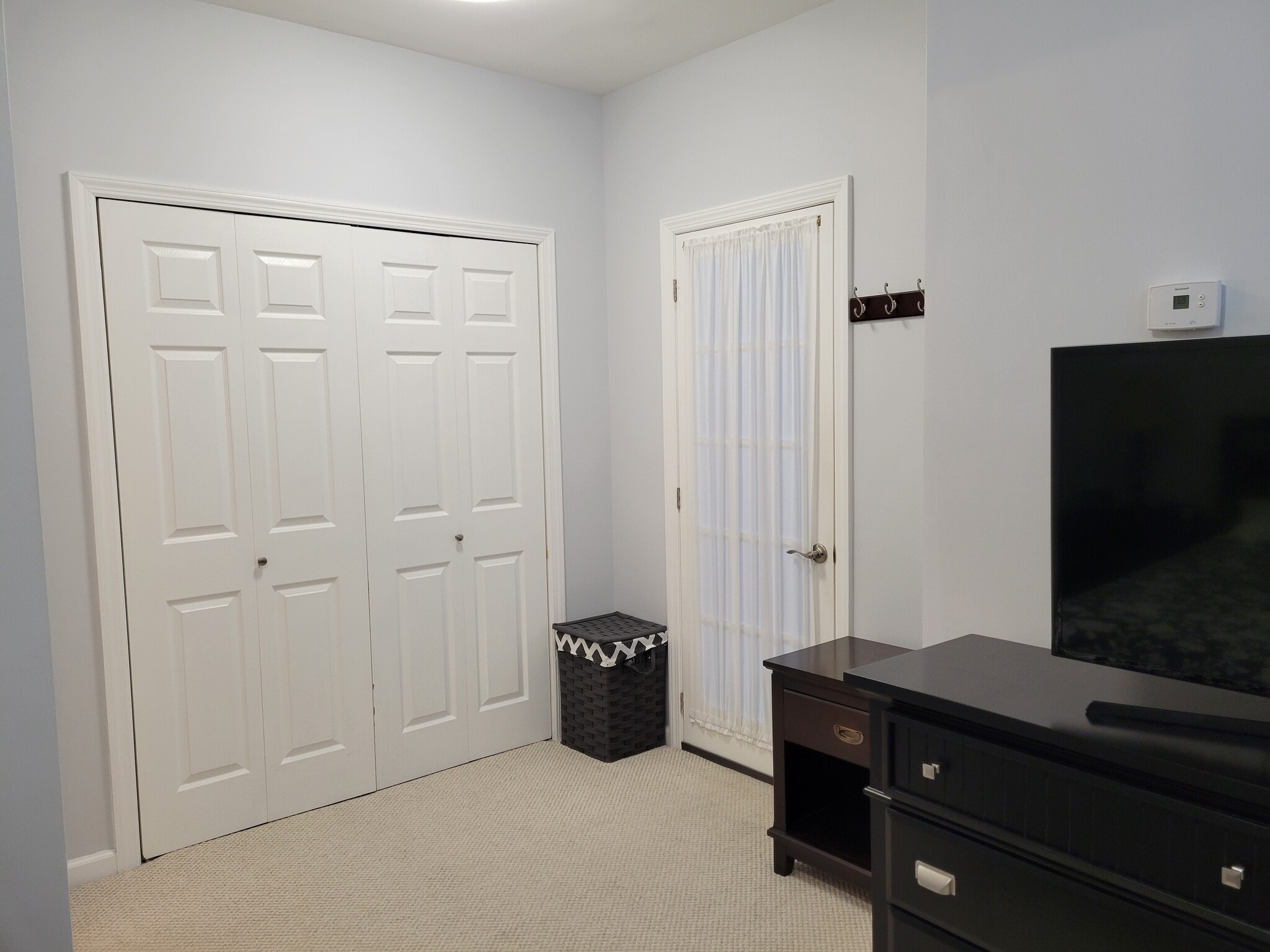 bedroom facing door and closet - 97-13 64th Rd