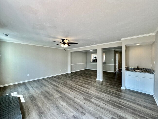 Building Photo - COMPLETELY Updated & Ready 08-21-26!! Sparkling Community Pool - Pet Friendly - Fenced Backyard!