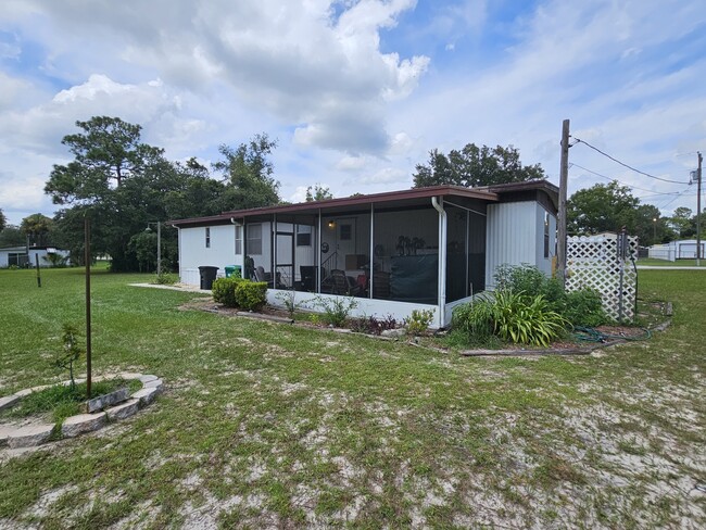 Building Photo - 7096 W Jackson Ln
