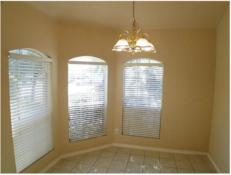 Wake up to warm stylish breakfast room - 19410 Maywood Falls Cir
