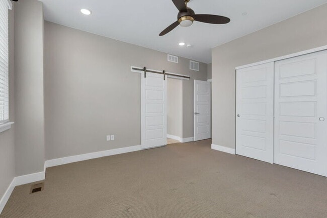Building Photo - 1555 W 67th Ave