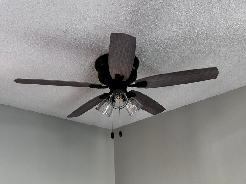 New ceiling fan and light in living room - 122 Turnwood Ln