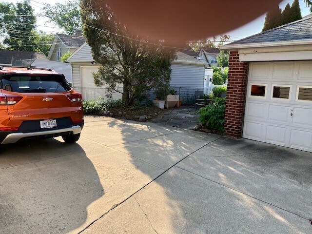 garage and behind house parking - 17003 Hilliard Rd