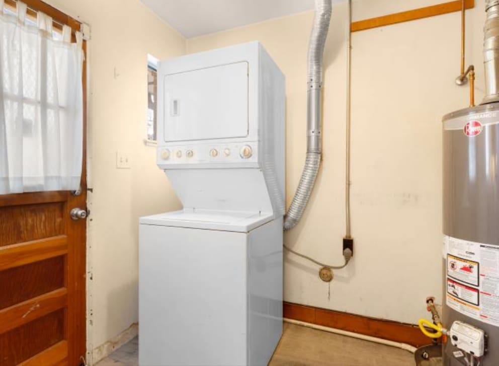 Washer/Dryer. Room also includes hooks for bike storage - 2220 Irving St