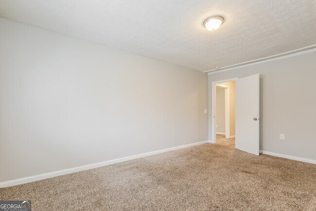 Building Photo - 8721 W Bourne Dr