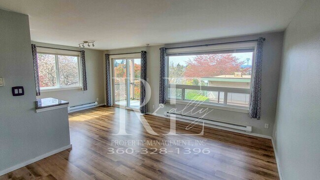 Building Photo - Modern Manette 1BR Condo with Private Pati...