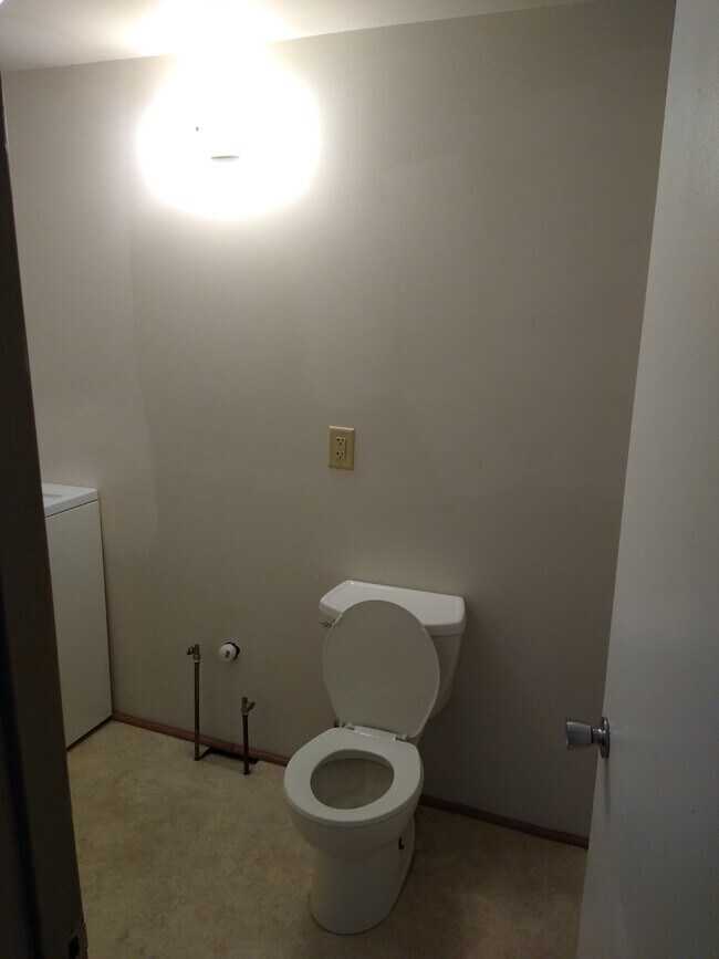 Half bath laundry room - 1402 Copperfield Ave