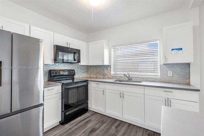 Building Photo - 1176 NW 48th St