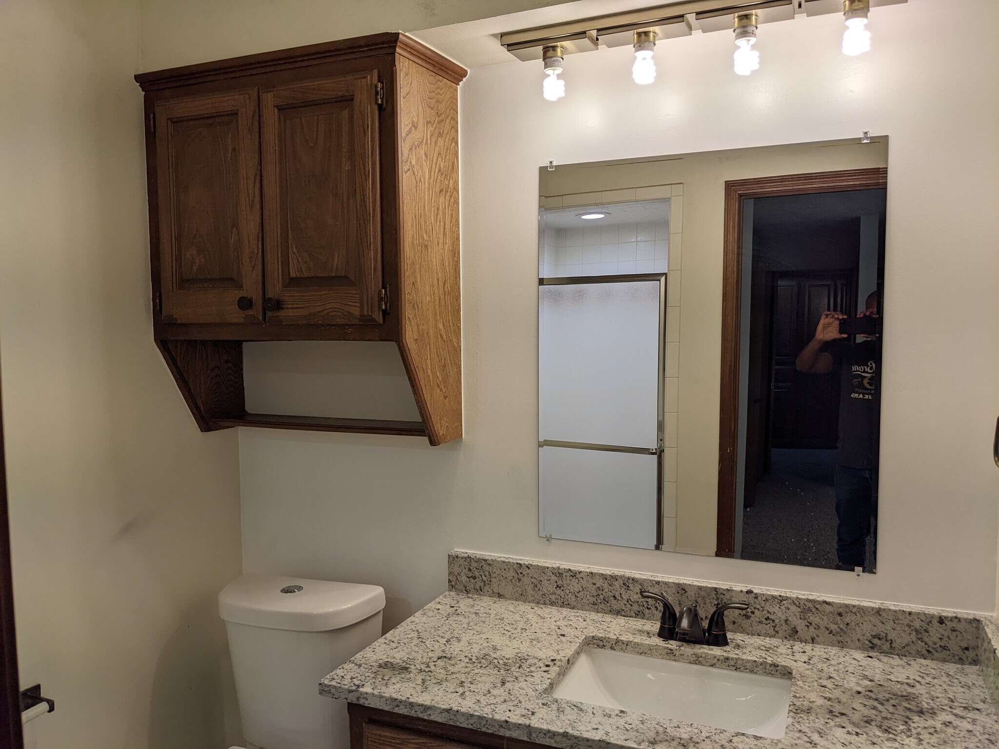 Master bath with New granite countertops, toilet - 1618 Julie Plz