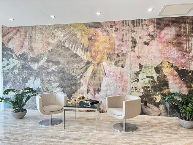 Building Photo - 10275 Collins Ave