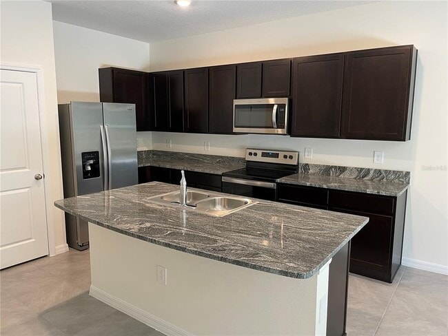 Building Photo - 8708 Milestone Dr