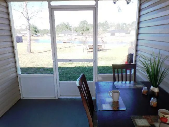 Building Photo - Charming 3BR Home with Open Floor Plan, Screened Porch & Covered Front Porch in Lakeland