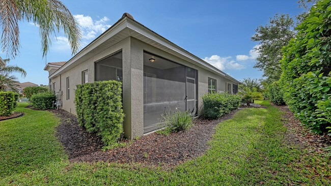 Building Photo - 2/2 plus den/office Villa in with a 2 car garage