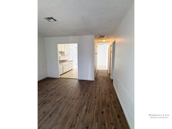 Building Photo - Spacious 2br/1ba, LOW Sec. Deposit, NEW FLOORS, LRG. Bedroooms, Private Patio, Garage!!