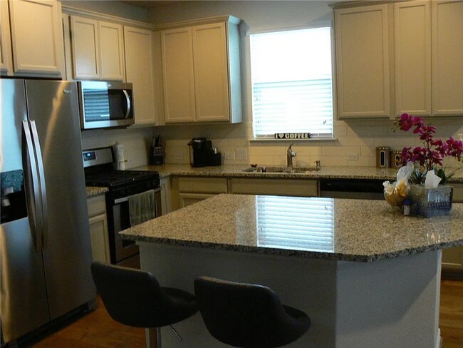 Building Photo - Coming Soon 4BR/2.5BA w/ Fenced Yard + Assigned Parking in Round Rock, TX