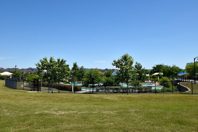 Building Photo - A Lazy River Community in your Future! Sunfield Master Planned Community