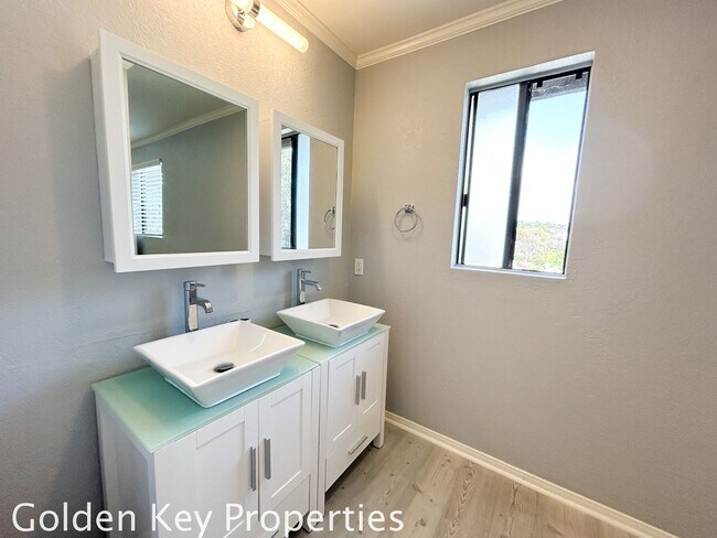 Building Photo - Welcome to this stunning ***unfurnished*** tri-level condo in the desirable Casitas de la Costa c...