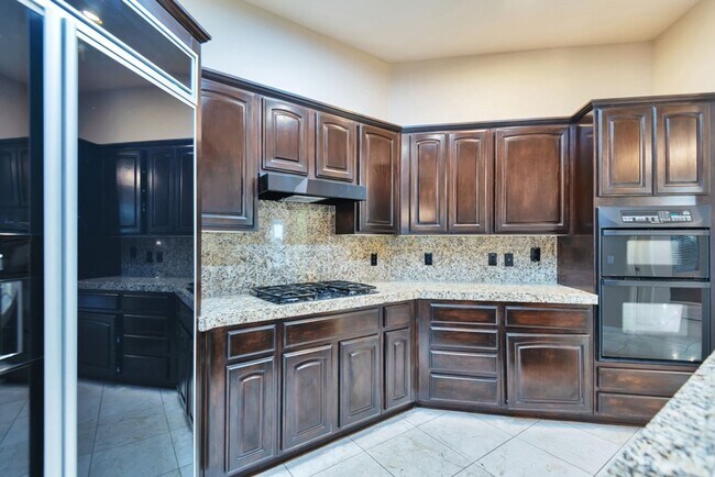 Building Photo - Experience luxury living in the prestigious Gainey Village!