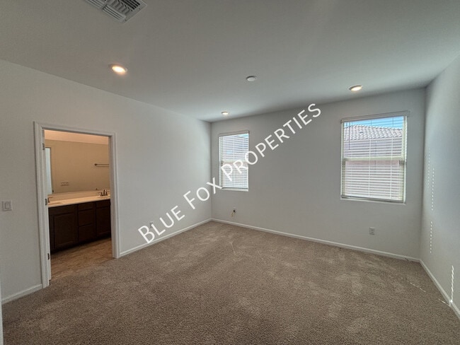 Building Photo - 7095 W Jadewood Ln
