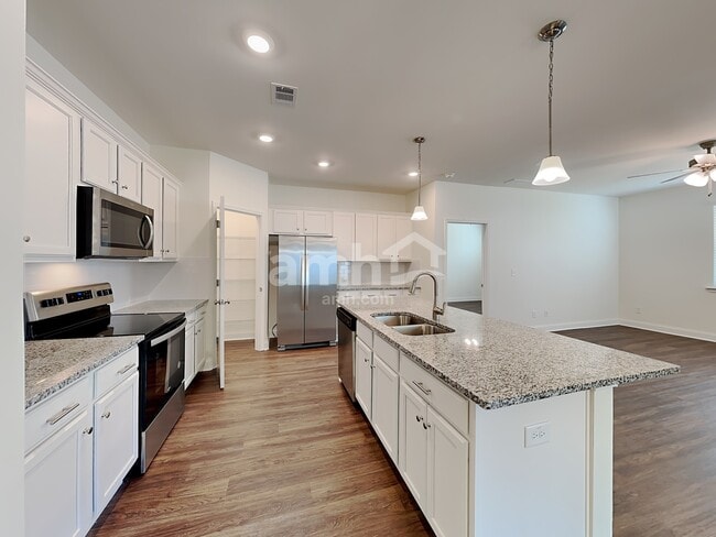 Building Photo - 7060 Creeksong Dr