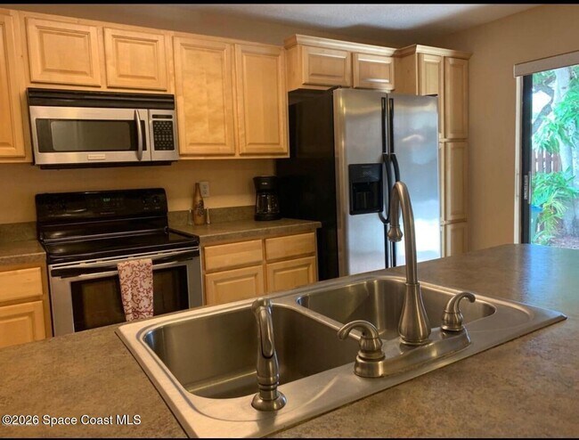 Building Photo - 8710 Hibiscus Ct