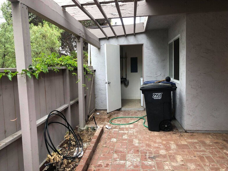 Patio; laundry room in the middle - 9594 Easter Way
