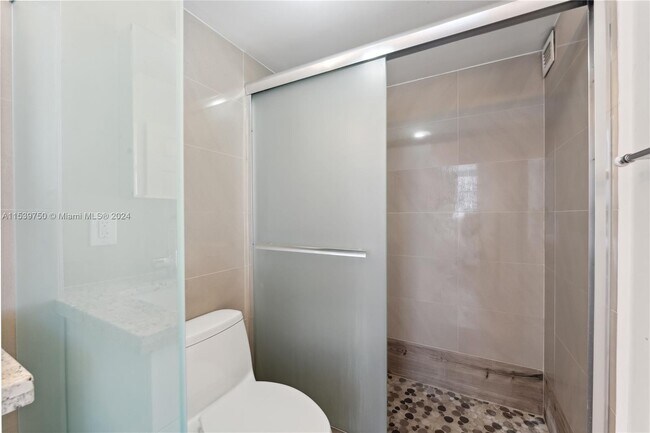 Building Photo - 9511 Collins Ave