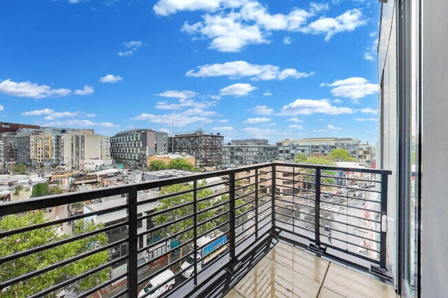Building Photo - Top floor residence in elevator building with sweeping views.
