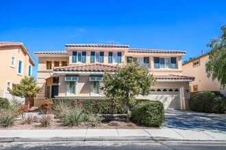 Building Photo - INCREDIBLE 4 BEDROOM IN GUARD GATED COMMUN...