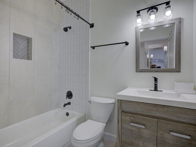 Building Photo - Fully Furnished 3-Bedroom Home with Security & Modern Upgrades