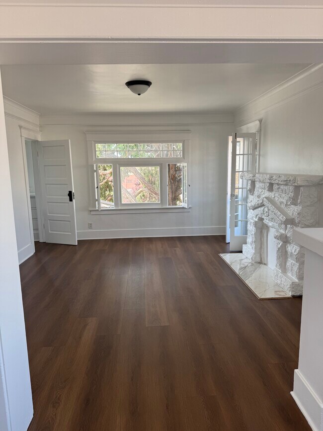 Large living room space with private balcony - 2030 6th Ave