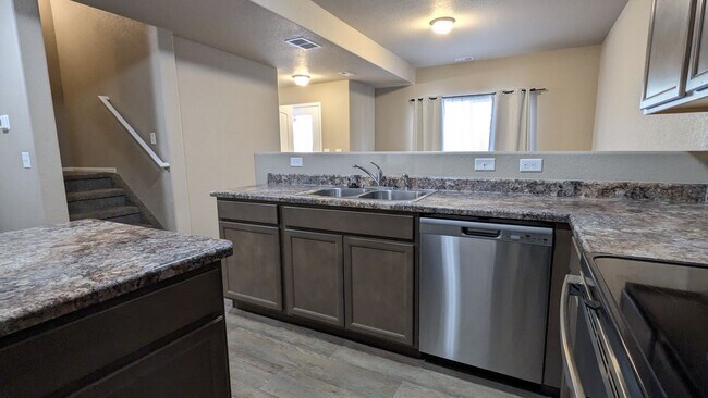 Building Photo - TWO STORY END UNIT TOWNHOME 3 BED/2.5 BATH...