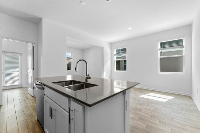 Building Photo - Modern Open-Concept Home with Designer Finishes and Community Amenities.