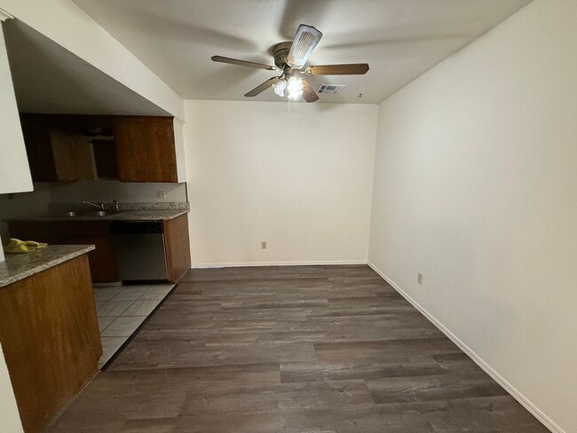 Building Photo - Three bedroom duplex with vinyl flooring. ...