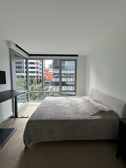 Bedroom w/ Automated Blackout Curtains - 10700 NE 4th St