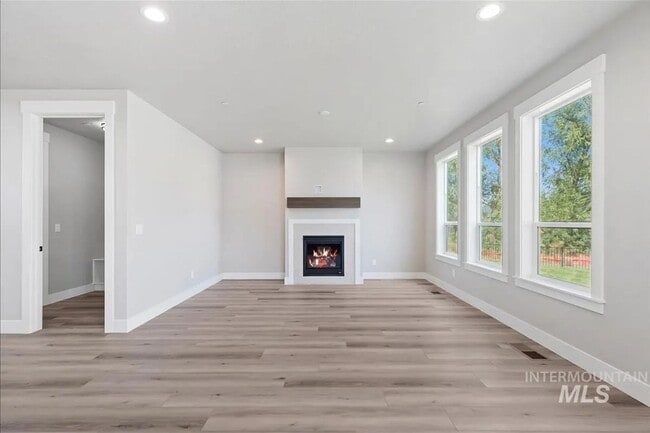 Building Photo - Brand New Spacious 4-Bedroom Home with 3-Car Garage, Granite Kitchen & Prime Middleton Location