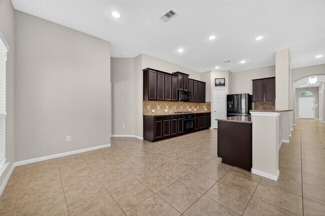 Building Photo - 6422 St Bernadette Dr