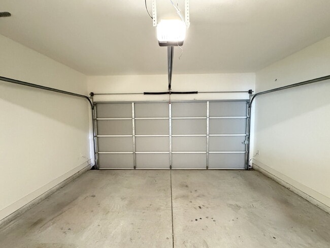 Building Photo - Stylish 3BR Townhome with Private Yard & T...