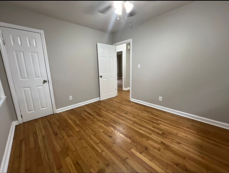 Building Photo - COMING SOON: Classic charm, peaceful living, your Forest Park retreat awaits in this spacious 3-b...